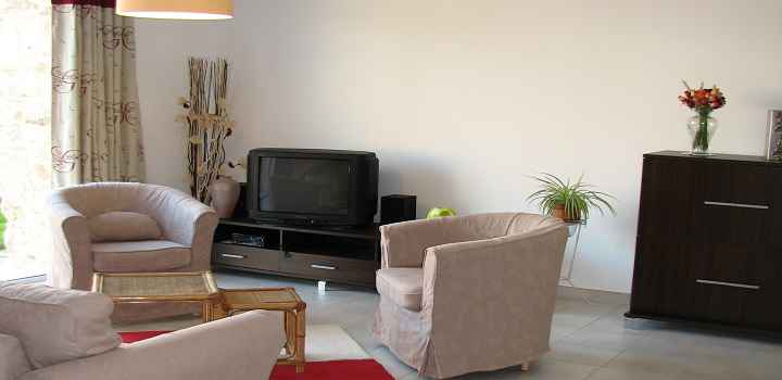 Self catering cottages France tv and armchairs